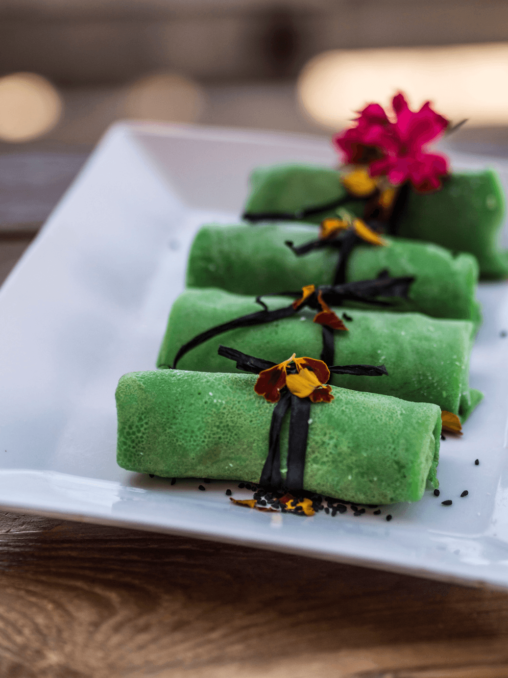 Fresh green crepes with herbs