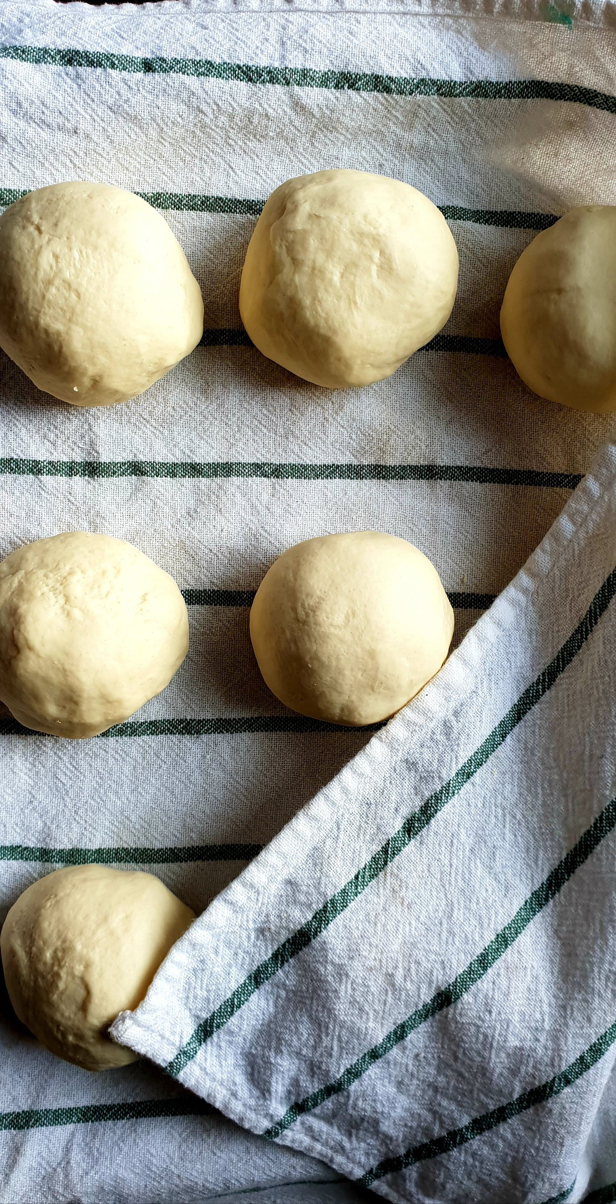 Freshly made bread dough rolls